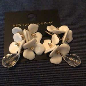 White and gold dangle earrings